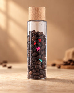 Bouteille sensorielle Éclat de café : des grains de café et de petites fleurs, bouchon en bois